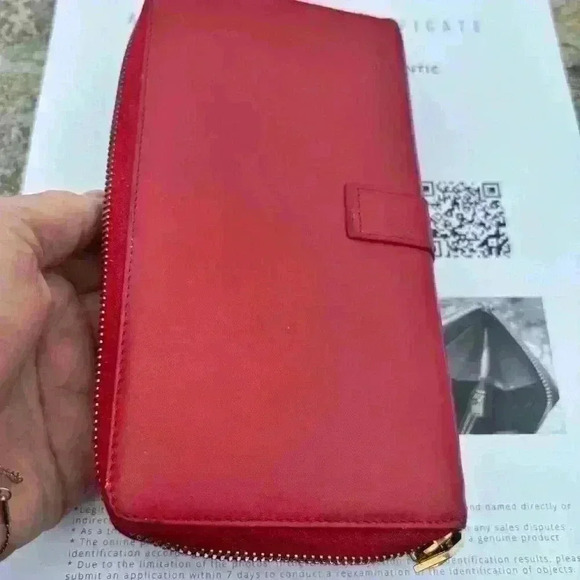 Red YSL long zippy wallet. Calfskin Leather. In GUC. Minor wear. Comes with COA - Picture 5 of 14